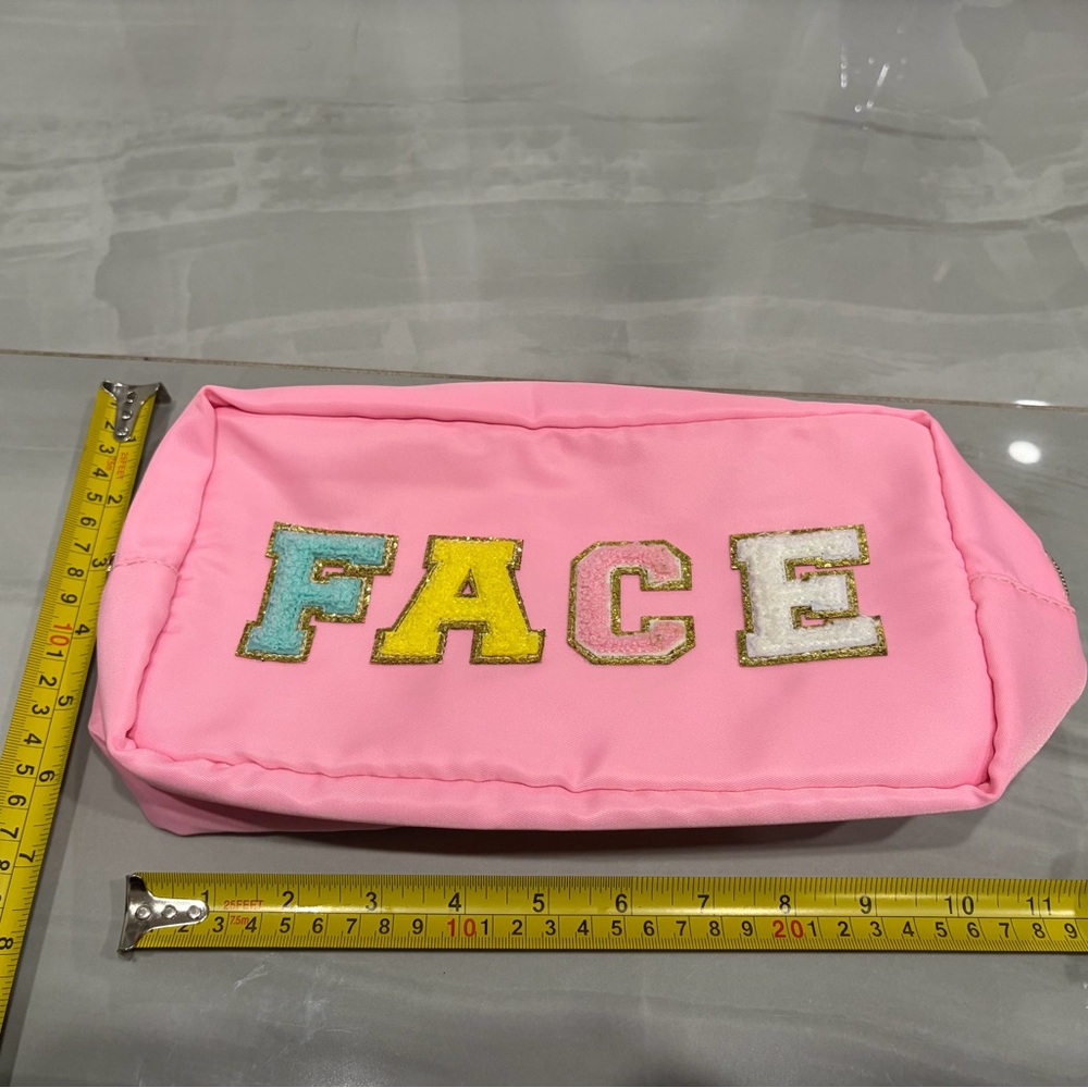 Amazon Pink Cosmetic Bag with Colorful FACE Design